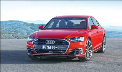  ?? PHOTOS PROVIDED TO CHINA DAILY ?? The new Audi A8 is the first series-production automobile in the world to drive in an automated manner in traffic situations.