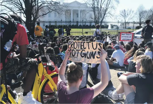  ?? AFP ?? Hundreds of high school and middle school students from Washington, Maryland and Virginia gathered in front of the White House to support gun control in the wake of the Florida shooting on Wednesday last week when 17 pupils and teachers were shot dead...