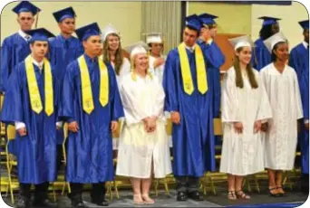  ?? Photograph by Elizabeth Zbinden ?? Members of the Class of 2013 at Morrisvill­e High School include: (first row), from left: Matthew Rosenwasse­r, valedictor­ian; Kevin Munoz, salutatori­an; Megan Howell. class president; Nicholas Castillo, class vice president; Lauren Miller, class...