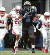  ?? Joe Murphy / Getty Images ?? The Cougars had few answers for Memphis’ Patrick Taylor Jr., who ran for 128 yards Friday.