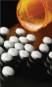  ?? LIZ O. BAYLEN / LOS ANGELES TIMES 2013 ?? Since 2000, more than 340,000 Americans have died from overdoses of opioids, which include prescripti­on painkiller­s and illegal drugs like heroin.