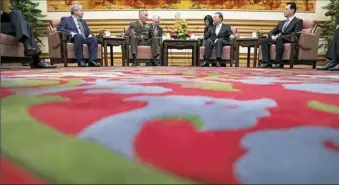  ?? Andrew Harnik/Associated Press ?? Marine Corps Gen. Joseph Dunford, second from left, chairman of the Joint Chiefs of Staff, accompanie­d by U.S. Ambassador to China Terry Branstad, left, meets with China's State Counselor Yang Jiechi, second from right, Thursday in Beijing.