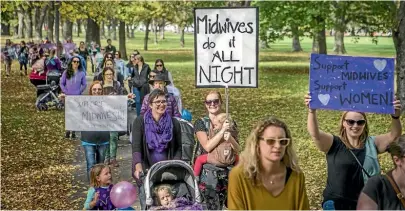  ?? PHOTO: JOHN KIRKANDERS­ON/STUFF ?? Yesterday’s march in Christchur­ch. Midwives say their labour of love is becoming too much to bear.