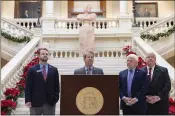  ?? ARVIN TEMKAR/ARVIN.TEMKAR@AJC.COM ?? Gov. Brian Kemp speaks Monday at the Capitol in Atlanta, where he announced that he’ll provide a $1,000 retention bonus to state employees, teachers and school support staff this holiday season. He also spoke about funding for school safety.