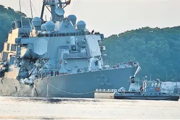  ??  ?? File photo of the USS Fitzgerald returns to Fleet Activities (Fleact) Yokosuka following a collision with a merchant vessel while operating southwest of Yokosuka, Japan. — Reuters photo