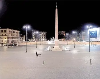  ?? — AFP photo ?? A view of Piazza del Popolo in Rome. Italy has establishe­d a curfew on the whole national territory from 10pm to 5am, aimed at stopping the spread of the Covid-19 (new coronaviru­s) pandemic.
