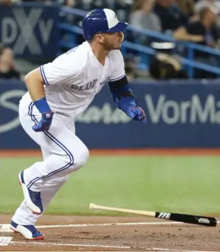  ?? STEVE RUSSELL/TORONTO STAR ?? Josh Donaldson returned to the Jays lineup and hammered a double to left-centre in his first at-bat after a calf injury. Jose Bautista, left, cooled after a torrid stretch.