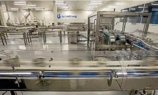  ?? PHOTO: JOHN KIRK-ANDERSON/STUFF ?? Jamestrong Packaging has opened a highly mechanised factory in Christchur­ch for milk-powder makers including Synlait.