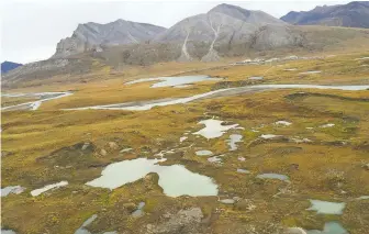  ?? BEN ABBOTT ?? The ground is collapsing as ancient buried glaciers melt near the Toolik Field Station. Ice loss releases sediment and nutrients into the newly formed lake and any downstream rivers, thus altering the ecosystem.