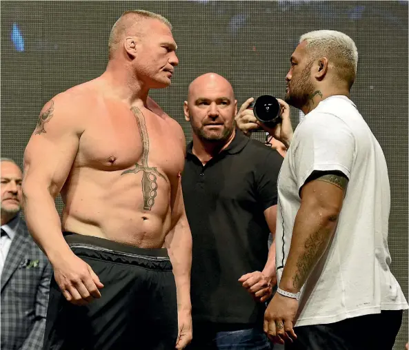  ??  ?? Mark Hunt, right, hasn’t fought since his match-up with Brock Lesnar in July.