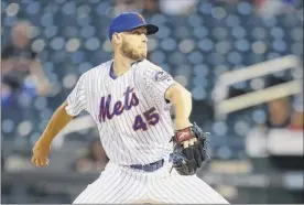  ?? Mike Stobe / Getty Images ?? Zack Wheeler struck out seven and allowed seven hits and two walks in seven innings to get the win for the Mets against the Diamondbac­ks.