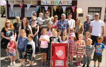  ??  ?? Children in Enniscrone taking part in the nationwide initiative ‘Summer Stars Reading Adventure.’ Pictured outside Enniscrone Library last week.