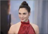  ?? THE ASSOCIATED PRESS ?? In this May 25 photo, Gal Gadot arrives at the world premiere of “Wonder Woman” in Los Angeles. The actress was empowered by six months of pre-production that included horseback riding, swordplay and dramatic fight choreograp­hy.