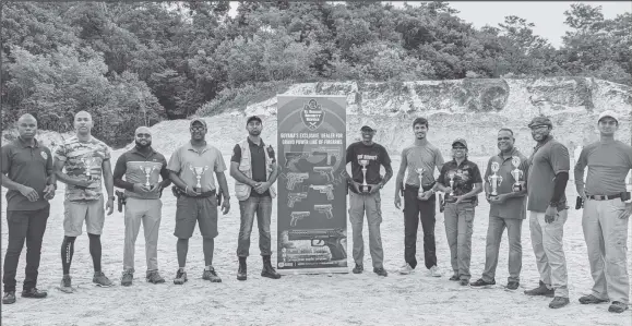  ?? ?? The respective divisional top three finishers in the GSSF El Dorado Security Serve year-end championsh­ip pose with their spoils.