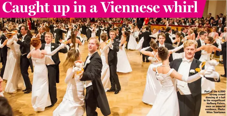  ??  ?? Part of the 6,000 strong crowd dancing at a ball in the magnificen­t Hofburg Palace, once an imperial residence. Photo: Wien Tourismus