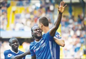  ?? GLYN KIRK/AFP ?? Chelsea midfielder Victor Moses celebrates scoring against Burnley in their Premier League match at Stamford Bridge in London on Saturday.