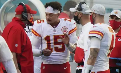  ??  ?? Patrick Mahomes talks to Chiefs head coach Andy Reid on the sidelines during Sunday’s game. Photograph: Wilfredo Lee/AP