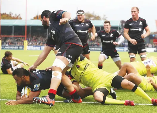  ?? PICTURES: Getty Images ?? Steamrolle­r: Billy Vunipola crashes through to score Saracens’ third try