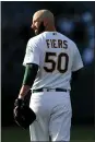  ?? RAY CHAVEZ — STAFF ARCHIVES ?? A’s pitcher Mike Fiers prepares for a game in Oakland on July 3. Fiers says he expects retributio­n from Houston players for outing their past cheating.