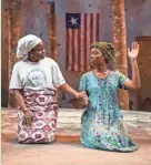  ?? MICHAEL BROSILOW ?? Nancy Moricette and Jacqueline Nwabueze perform in Milwaukee Repertory Theater’s production of “Eclipsed.” The Rep has made a profession­al three-camera video of the show available online for safer at-home viewing.