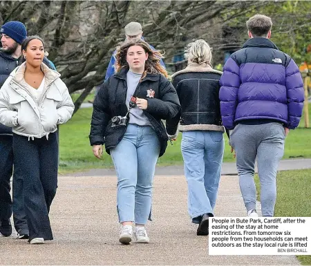  ?? BEN BIRCHALL ?? People in Bute Park, Cardiff, after the easing of the stay at home restrictio­ns. From tomorrow six people from two households can meet outdoors as the stay local rule is lifted