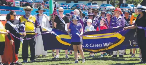  ?? Picture: ANDREA FALVO ?? EMPOWERING: Malanda girl Missy Clarkson leads the carers and survivors walk as the face of Cancer Council Queensland’s 2017 Tablelands Relay For Life.