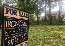  ?? KARA DRISCOLL / STAFF ?? A home on Devereux Road in Oakwood is listed by Irongate Realtors Inc. According to the Dayton Area Board of Realtors, the median sales price of Dayton-area homes in May was $133,950.