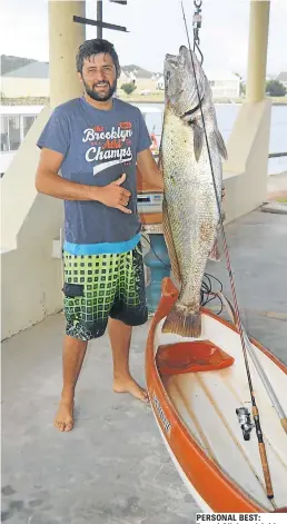  ?? Picture: JON HOUZET ?? PERSONAL BEST: Darryl Olivier with his 20.4kg kob and the canoe in which he landed it. He weighed it in at the Port Alfred Ski-boat Club last Saturday