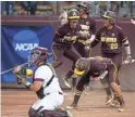  ?? CHERYL EVANS/THE REPUBLIC ?? Arizona State’s Morgan Howe (47) celebrates with her teammates after sliding safely into home on Saturday.