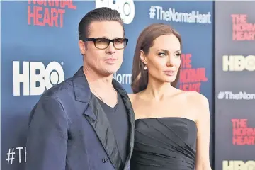  ??  ?? Pitt and Jolie attend the premiere of ‘The Normal Heart’ in New York, NY, US, on May 12, 2014. — Reuters file photo