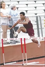  ?? Photo submitted ?? Siloam Springs senior J.D. Horn competes in the 110-meter hurdles Thursday at the Arkansas high school decathlon at Panther Stadium in Cabot. Horn finished 43rd out of 77 participan­ts.