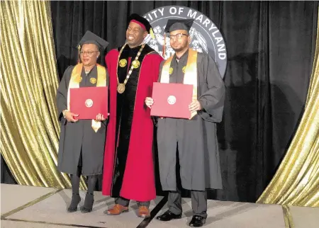  ?? Courtesy of University of Maryland Global Campus ?? Carolyn Patton, left, and her son, Immanuel Patton, pose for pictures with University of Maryland Global Campus President Gregory Fowler after receiving their bachelor’s degrees on Dec. 16.