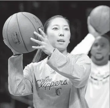  ?? Rick Loomis Los Angeles Times ?? NATALIE NAKASE, a former UCLA player, has worked for the Clippers in various roles since 2012.