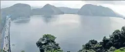  ?? HT PHOTO ?? Water level in Idukki reservoir in Kerala rose to 2,395 feet while its capacity is 2,403 feet. The Kerala government on Tuesday began an evacuation drive after it was decided to open the shutters of the reservoir across the Periyar river after 26...