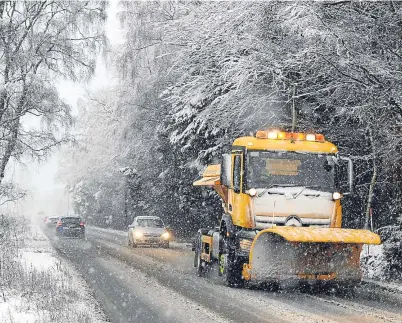  ??  ?? WINTER’S HERE: Snow is predicted to cause some disruption on roads, but is ‘fairly standard’ for the time of year