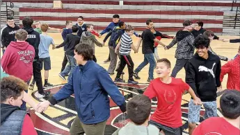  ?? Photo submitted ?? Middle school students practice folk dancing during physical education class.