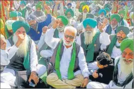  ?? PTI ?? Farmers holding a protest in Patiala on Friday.