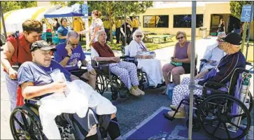  ?? Irfan Khan Los Angeles Times ?? are evacuated from Ridgecrest Regional Hospital following a magnitude 6.4 earthquake in 2019. Existing state law requires that by 2030, every hospital building is capable of operating following a quake.