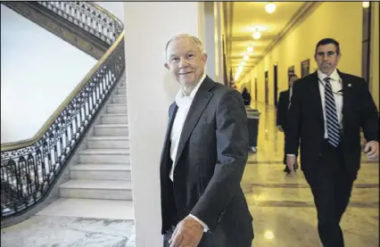  ?? J. SCOTT APPLEWHITE PHOTOS / ASSOCIATED PRESS ?? Attorney General-designate Sen. Jeff Sessions, R-Ala., was confirmed by a nearly party-line vote after Democrats harshly criticized him for being too close to President Donald Trump, too harsh on immigrants and too weak on civil rights.