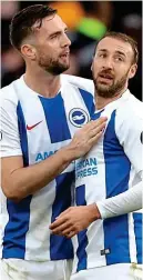  ??  ?? Age-defying: Glenn Murray (right) celebrates his goal