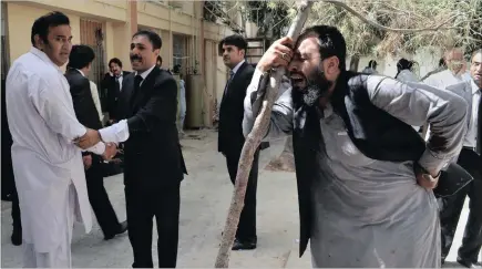  ?? PICTURE: AP ?? Pakistani lawyers mourn the deaths of their colleagues following a bomb blast. A powerful bomb went off inside a government-run hospital in the south-western city of Quetta yesterday, killing dozens of people and wounding dozens of others.