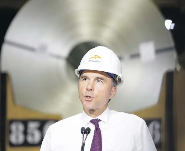  ?? PETER POWER/THE CANADIAN PRESS FILES ?? Finance Minister Bill Morneau’s announceme­nt of “provisiona­l safeguard” measures on seven steel products has prompted worries in the constructi­on sector about a possible supply shortfall and price hikes that won’t be compensate­d by tariff refunds.