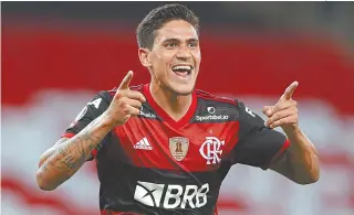  ?? SILVIA IZQUIERDO/AFP ?? Pedro celebra após marcar o segundo gol do Flamengo na fácil vitória sobre o Del Valle, no Maracanã