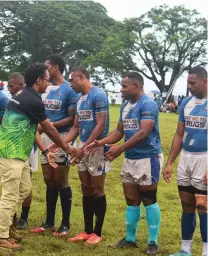  ?? Photo: Fiji Bitter Wairiki 7s ?? Veteran Police blue playmaker Livai Ikanikoda (second from right) during the Fiji Bitter Wairiki Sevens tournament in Taveuni.