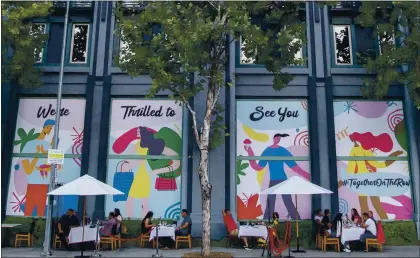  ?? ANDA CHU — STAFF ARCHIVES ?? Patrons dine outdoors at a Santana Row restaurant along Winchester Boulevard in San Jose on Sept. 5.