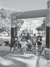  ?? COURTESY Safe in the Six ?? Teena James, center, poses with other participan­ts during last year’s Human Sex Traffickin­g and Mental Health Walk for Awareness in the Stop 6 neighborho­od.