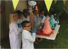  ?? LITTLE SCIENTISTS ?? LITTLE scientists excitedly at work on the experiment.
|