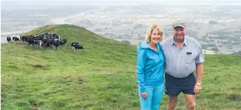  ?? ?? Max and Debbie Lutz on their O¯ taki dairy farm, overlookin­g the Ka¯ piti Coast.