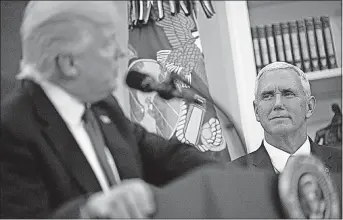  ?? [ERIC THAYER/ THE NEW YORK TIMES] ?? While Vice President Mike Pence, right, has made no overt effort to prepare to replace President Donald Trump, shown in this photo in the Oval Office in March, Pence appears to be cementing his status as Trump’s heir apparent.