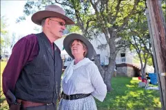  ??  ?? Dennis and Lesley McLeod, of Plumas Lake, portray Harry Alonzo Longabaugh (The Sundance Kid) and Etta Place – both members of the Wild Bunch outlaw gang – during the 10th annual Pioneer Day on Saturday in Smartsvill­e.